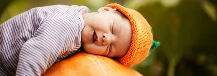 Chiropractic Andover MN Baby Sleeping on Pumpkin