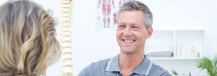 Chiropractic Andover MN Man with Spine Model